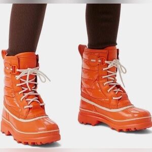 Free People Sorel Caribou Boot 
Vibrant Orange. Size 8
